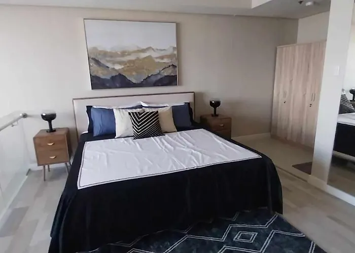 48 Sqm Loft With High Ceilings And City Views